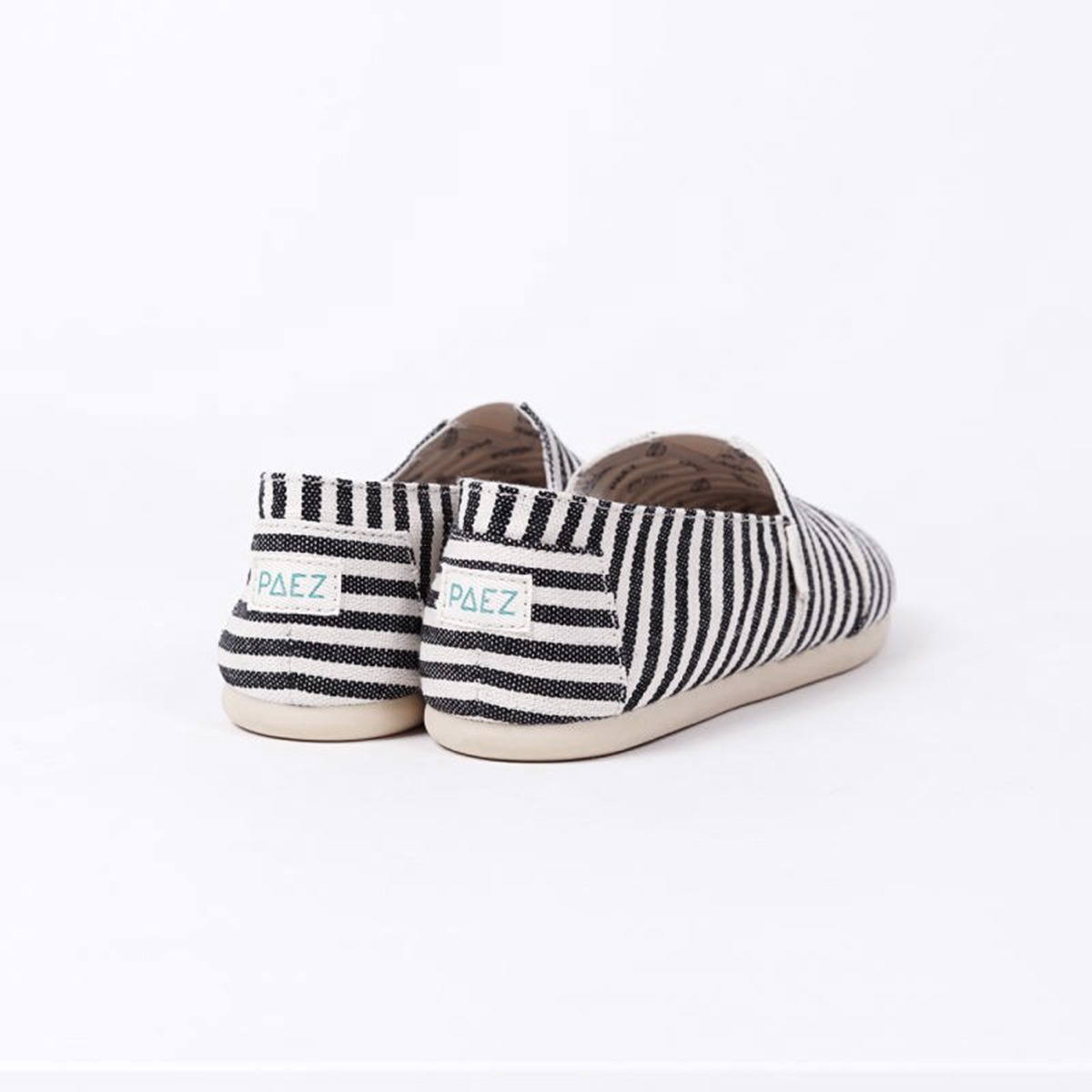 Back view of Alaska PAEZ Surfy Espadrille Shoes for Women, featuring black and white stripes.