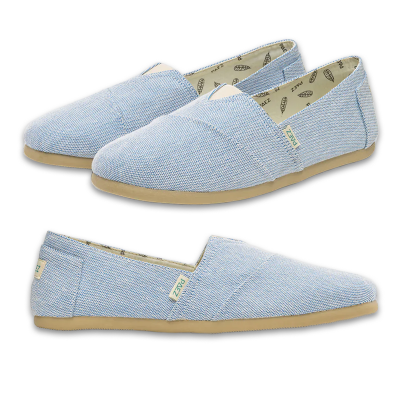 Pair of light blue PAEZ espadrille slip-on shoes displayed from two angles, highlighting the woven texture and beige soles.