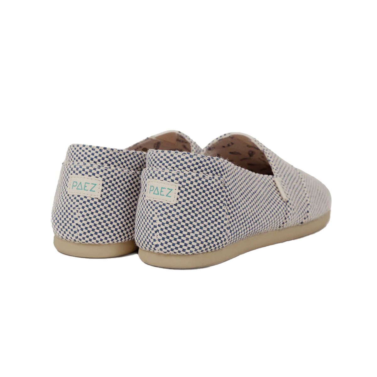 Back view of the PAEZ Panama Slip-On for Men, featuring a blue and white woven fabric upper with a beige rubber sole and branded heel tags.