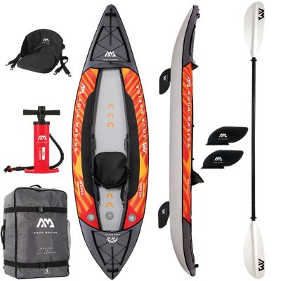 Complete Aqua Marina MEMBA Single Inflatable Kayak set, including the kayak with a red and yellow design, high-backrest seat, dual-blade paddle, manual pump, detachable fins, and a carrying bag.