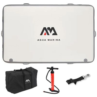 An Aqua Marina ISLAND inflatable platform with a grey border, featuring the brand’s logo in the center. Accessories include a black carrying bag, a red hand pump, and a safety strap.